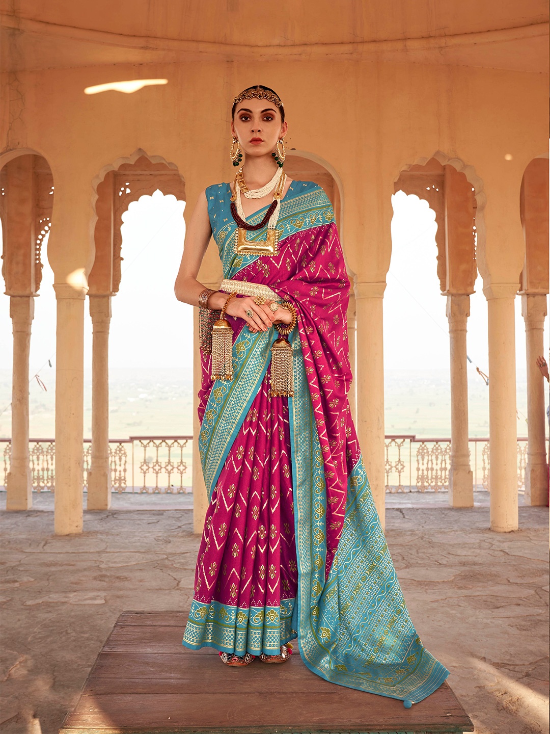 

Mitera Pink & Blue Ethnic Motifs Woven Design Saree