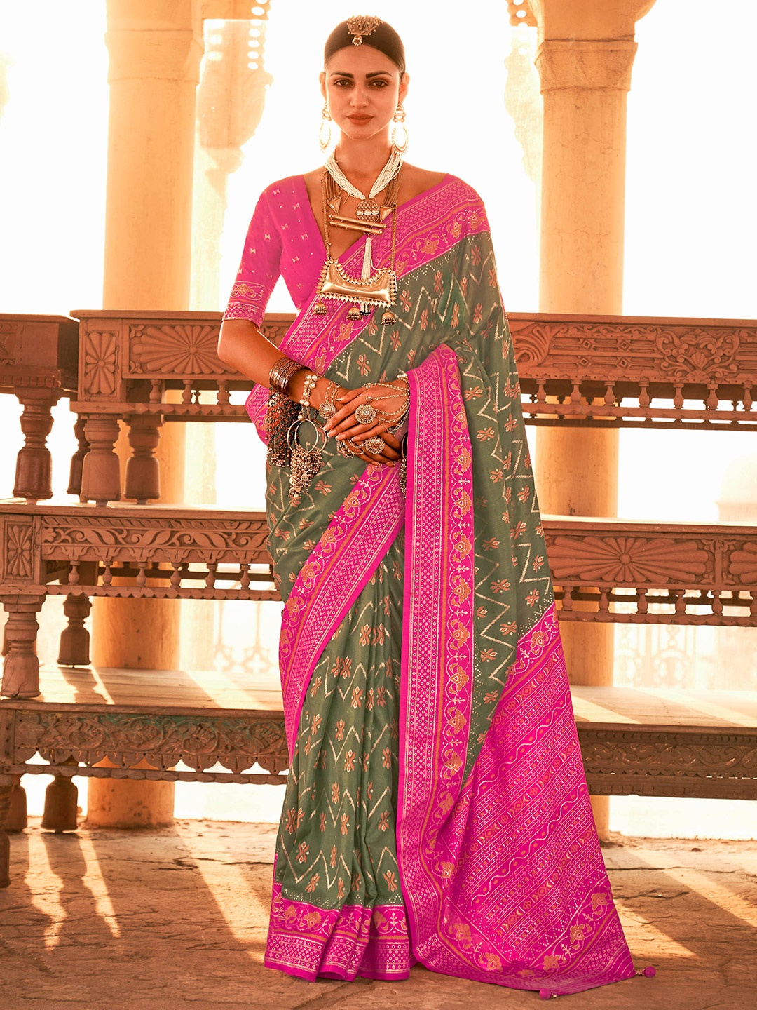 

Mitera Green & Pink Ethnic Motifs Woven Design Saree