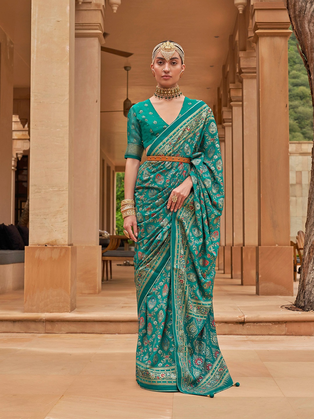 

Mitera Turquoise Blue & Gold-Toned Woven Design Sequinned Brasso Saree