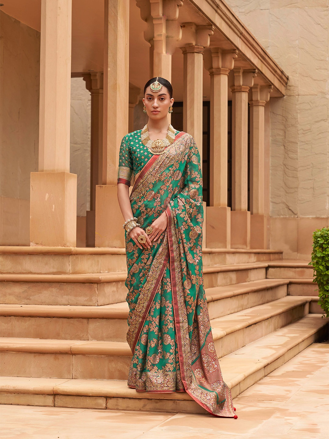 

Mitera Green & Red Woven Design Sequinned Brasso Saree