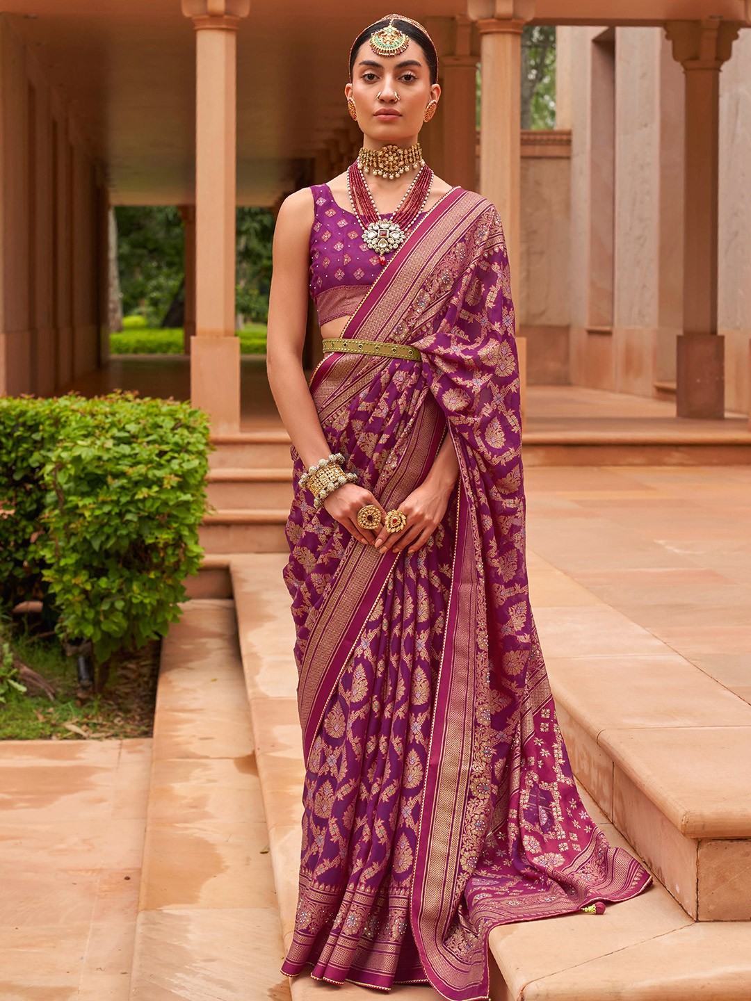 

Mitera Purple & Gold-Toned Woven Design Zari Brasso Saree