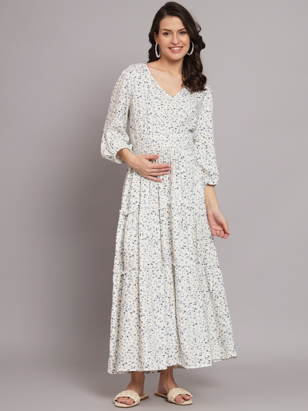 

The Vanca Off White Floral Printed Tiered Maternity Fit & Flare Maxi Dress