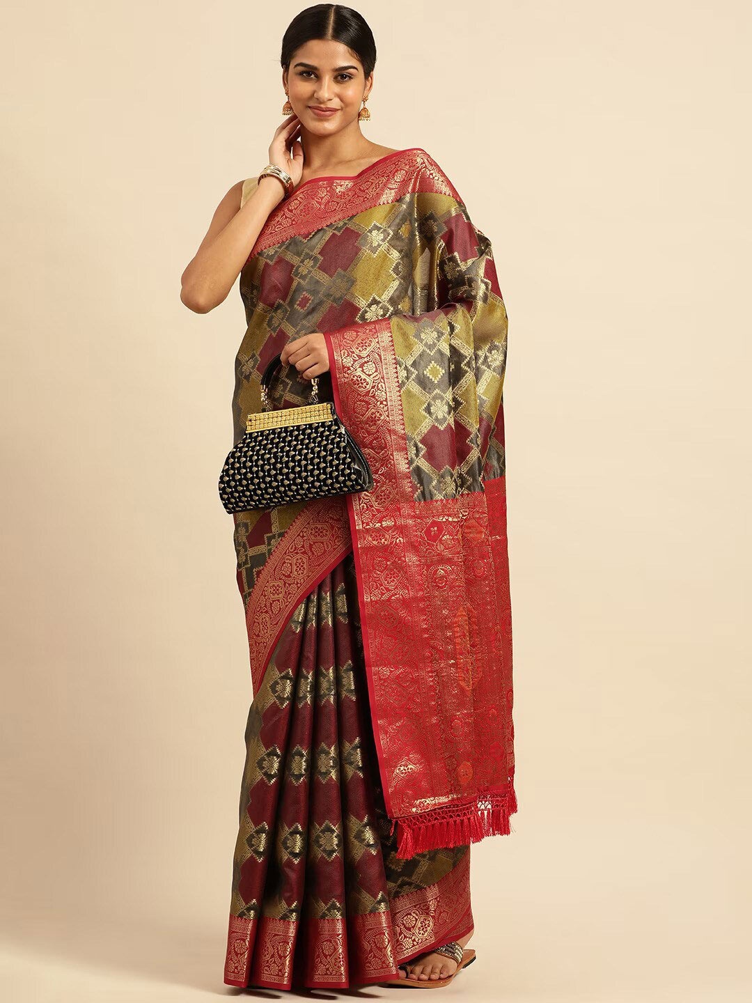 

Mitera Grey & Green Woven Design Zari Patola Saree