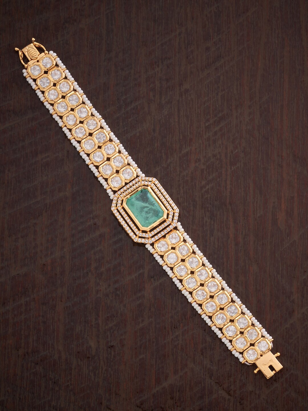 

Kushal's Fashion Jewellery Women Kundan Gold-Plated Link Bracelet