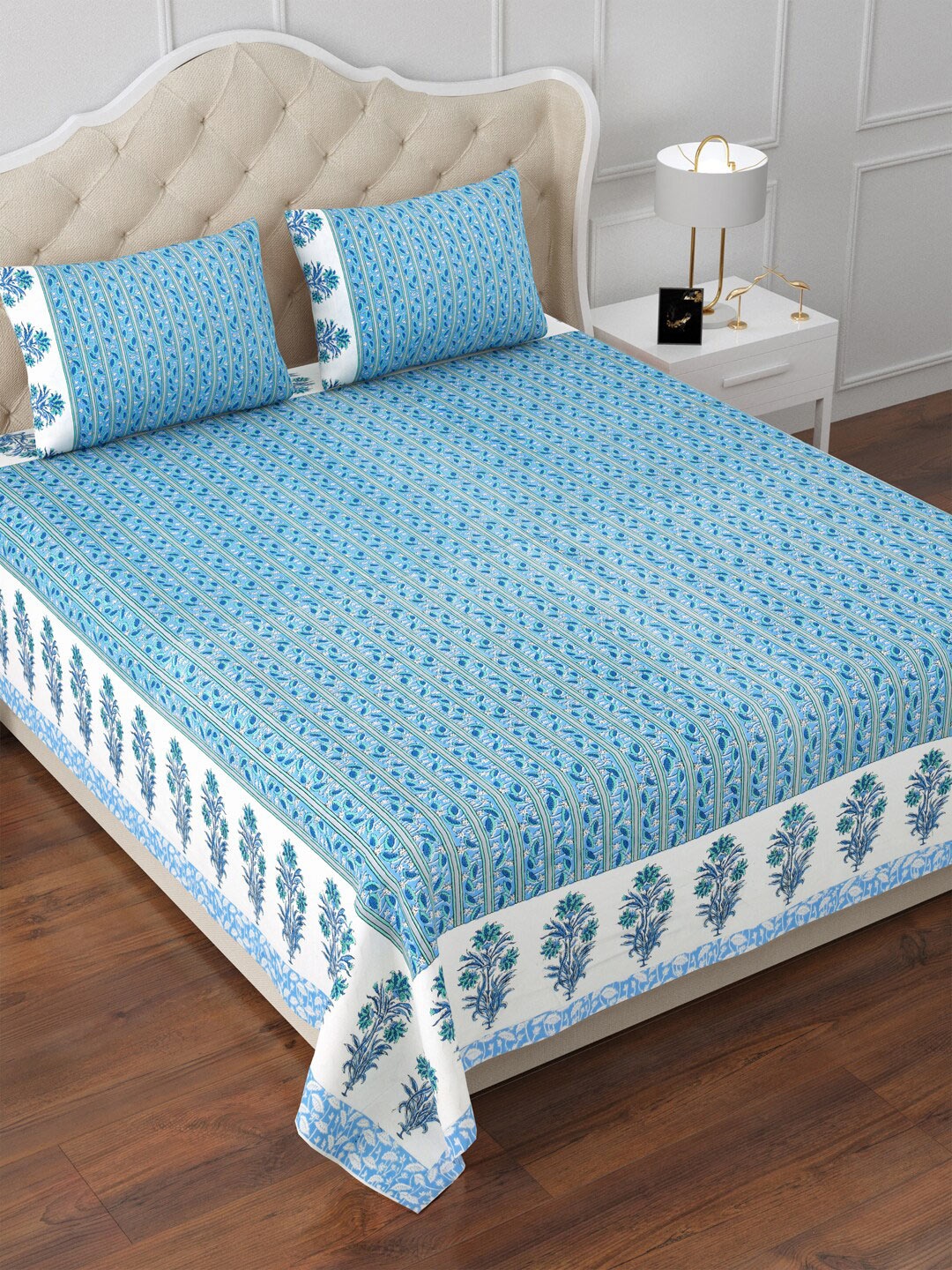 

Aapno Rajasthan Blue & White Floral 120 TC Cotton King Bedsheet & 2 Pillow Covers