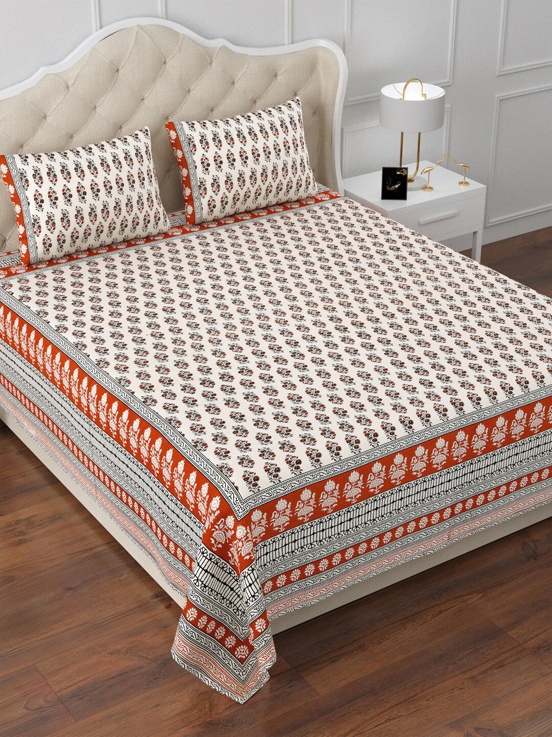 

Aapno Rajasthan Cream & Orange Floral 120 TC Cotton King Bedsheet & 2 Pillow Covers