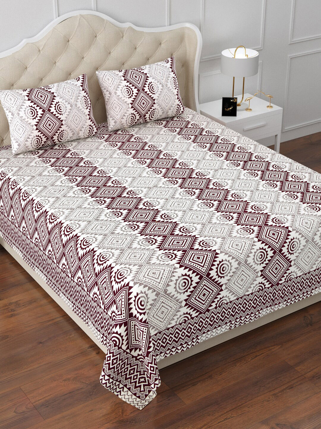 

Aapno Rajasthan White & Purple Geometric 120 TC Cotton King Bedsheet With 2 Pillow Covers