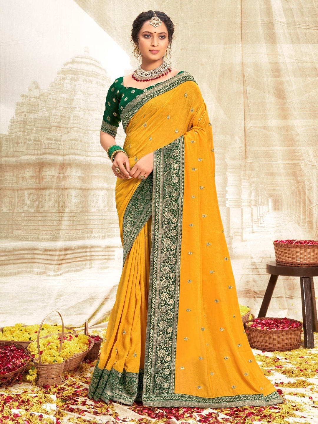 

Mitera Yellow & Green Ethnic Motifs Zari Art Silk Saree