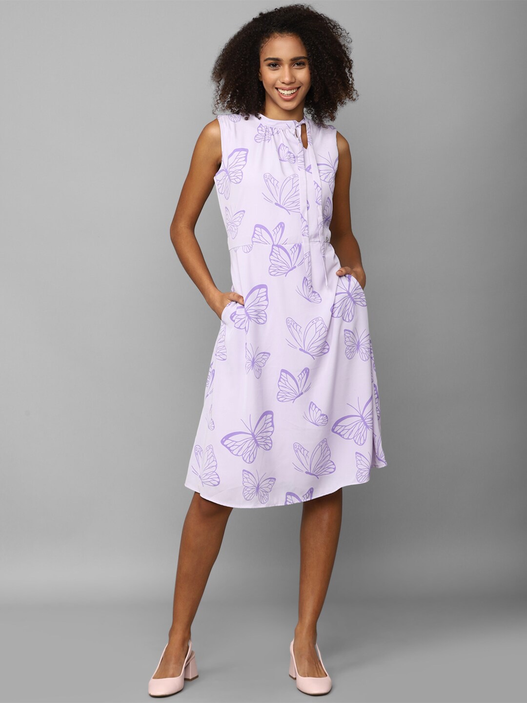 

Allen Solly Woman Conversational Printed Tie-Up Neck A-Line Dress, Lavender