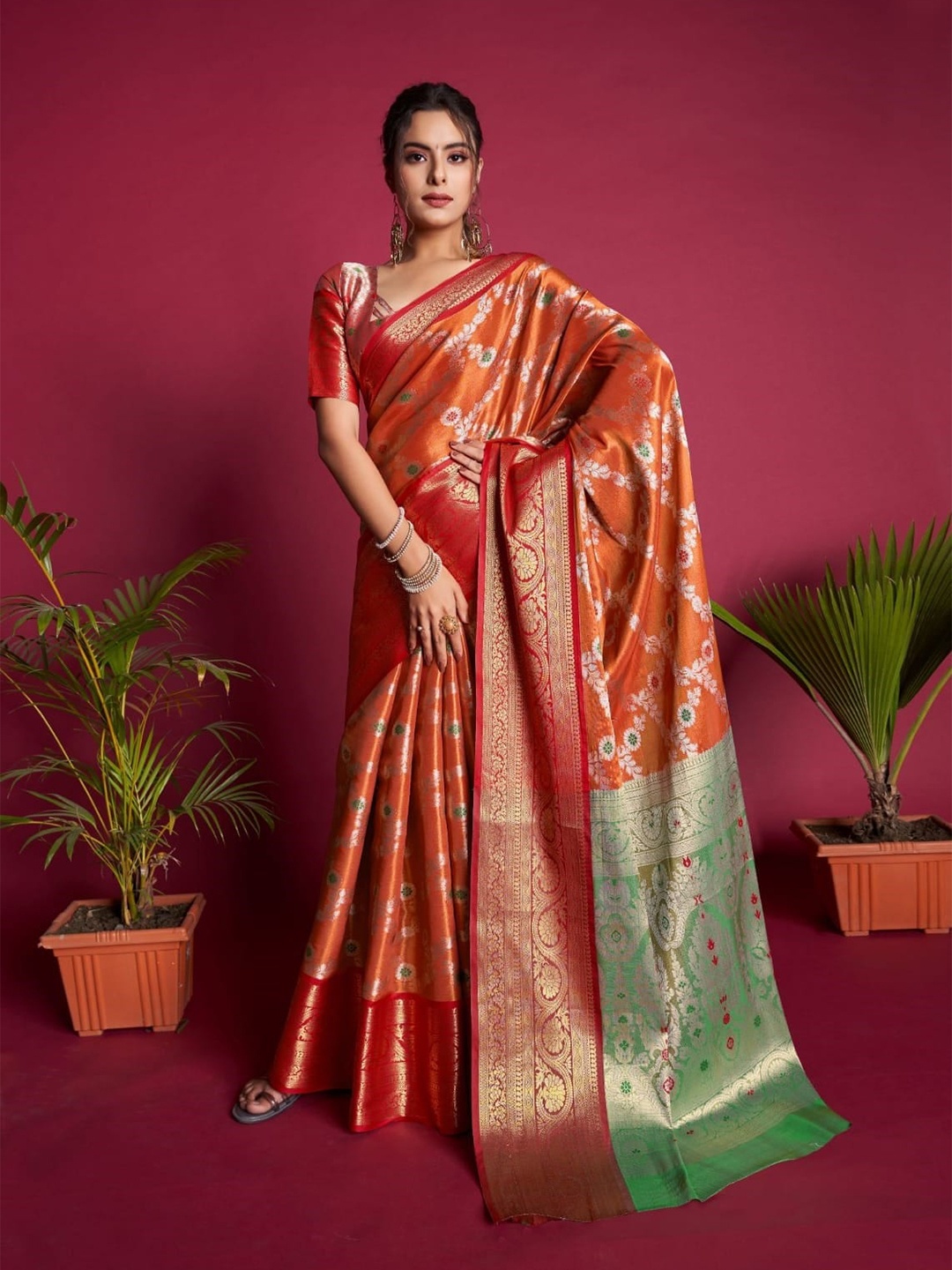 

Mitera Orange & Red Floral Woven Design Zari Banarasi Saree