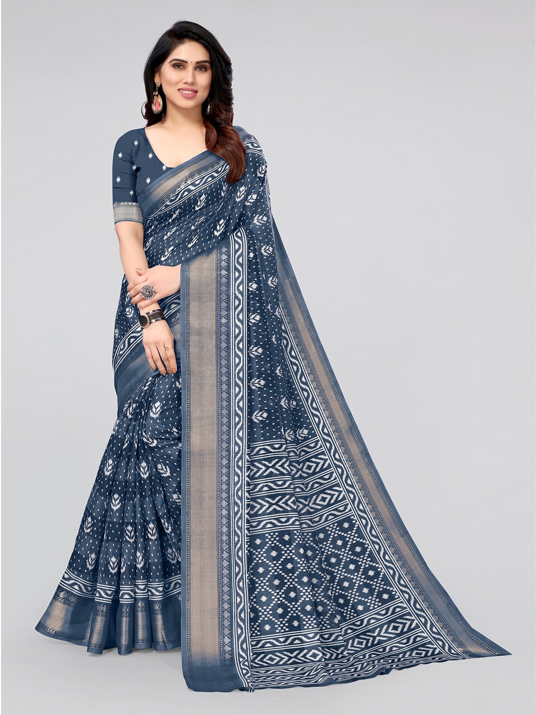 

MIRCHI FASHION Blue & White Ikat Printed Zari Saree