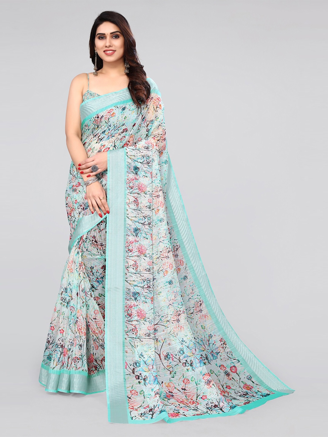 

MIRCHI FASHION Teal & Silver-Toned Floral Printed Zari Saree
