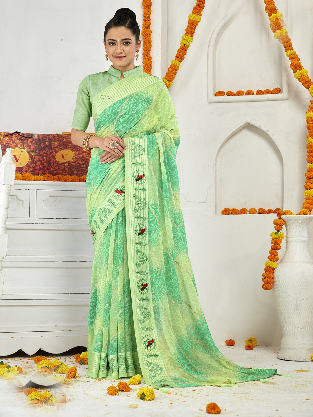 

Triveni Floral Printed Embroidered Pure Georgette Saree, Green