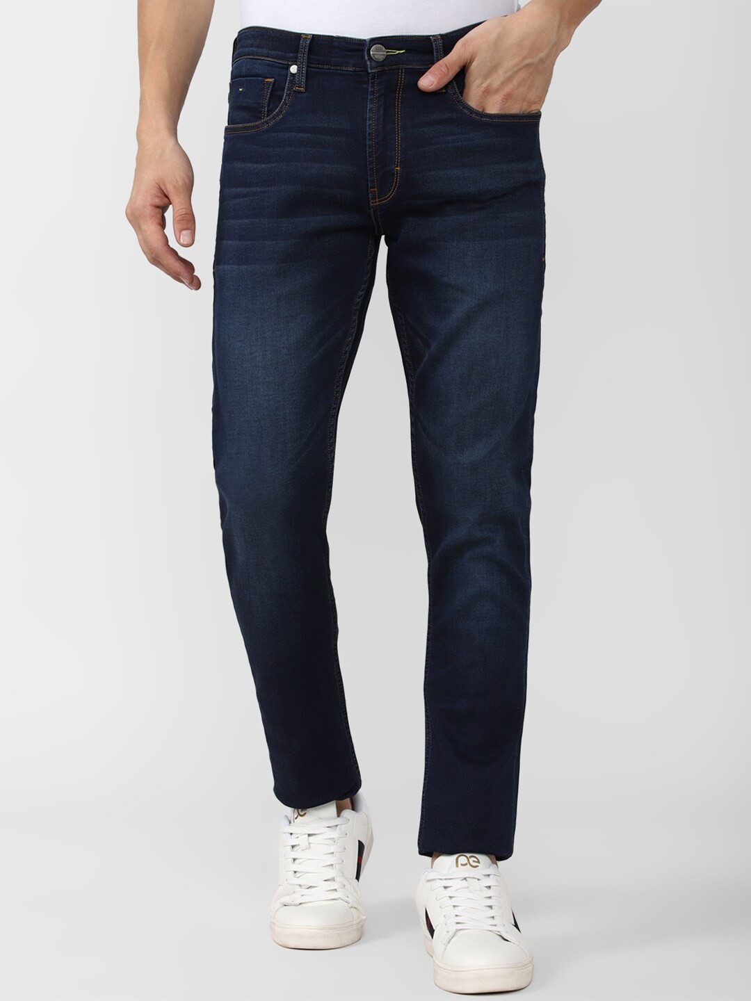 

Peter England Casuals Men Tapered Fit Light Fade Clean Look Stretchable Cropped Jeans, Navy blue