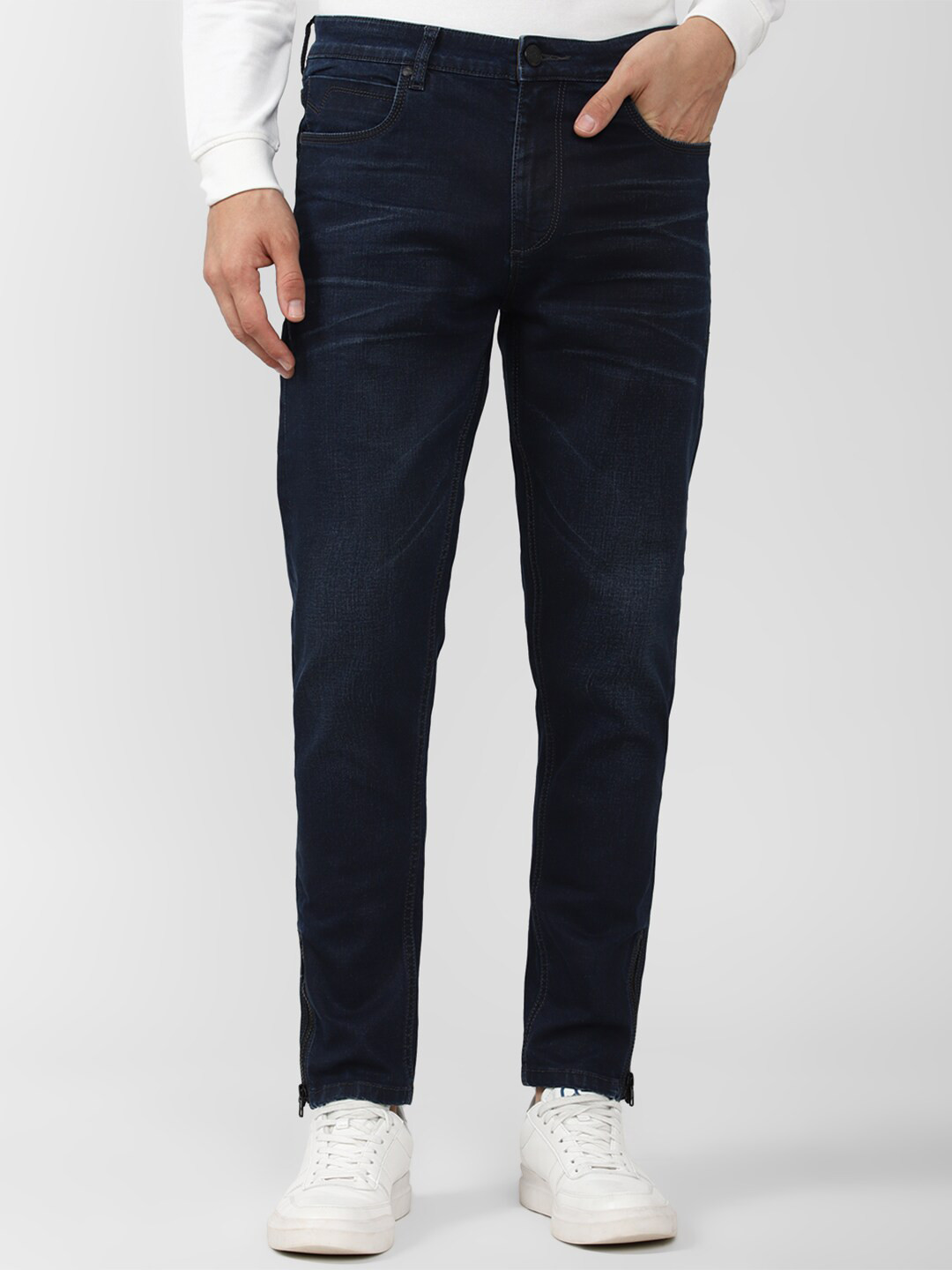 

Peter England Casuals Men Tapered Fit Mid-Rise Clean Look Jeans, Navy blue