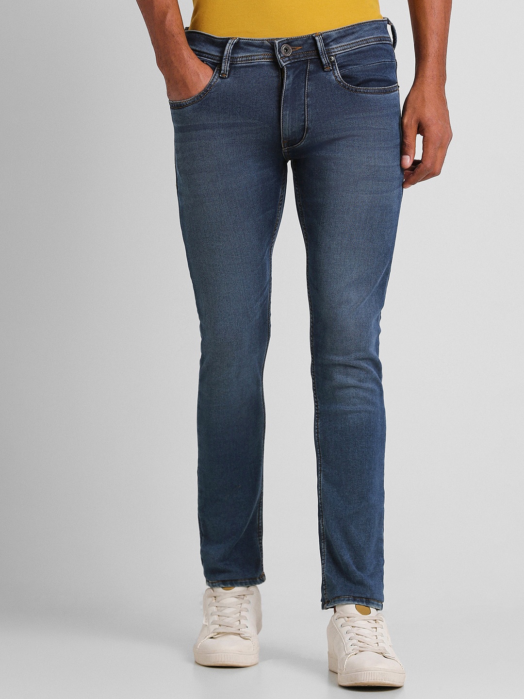 

Peter England Casuals Men Skinny Fit Light Fade Clean Look Stretchable Cropped Jeans, Navy blue