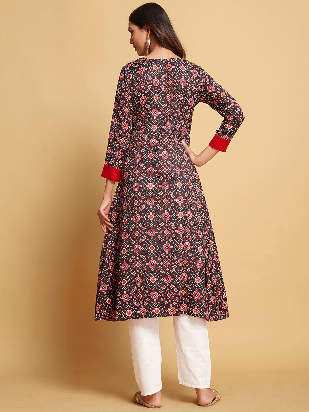 

Sangria Brown Ethnic Motifs Printed Patola A-Line Kurta & Trouser, Coffee brown