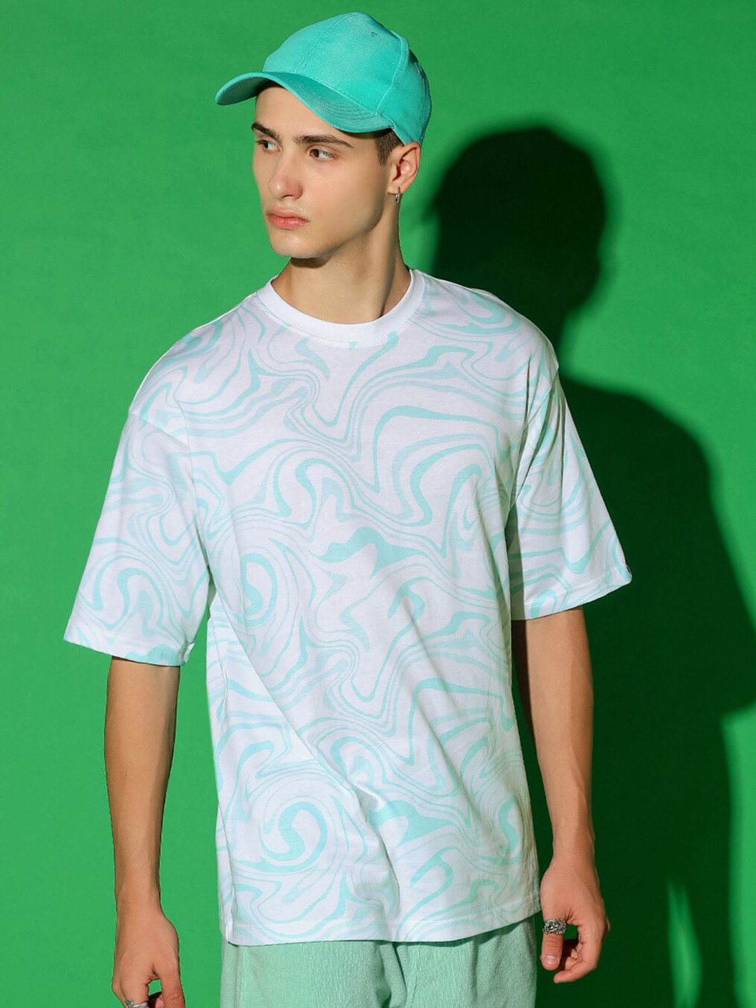 

Bewakoof White & Green Abstract Printed Drop Shoulder Sleeves Cotton Oversized T-shirt