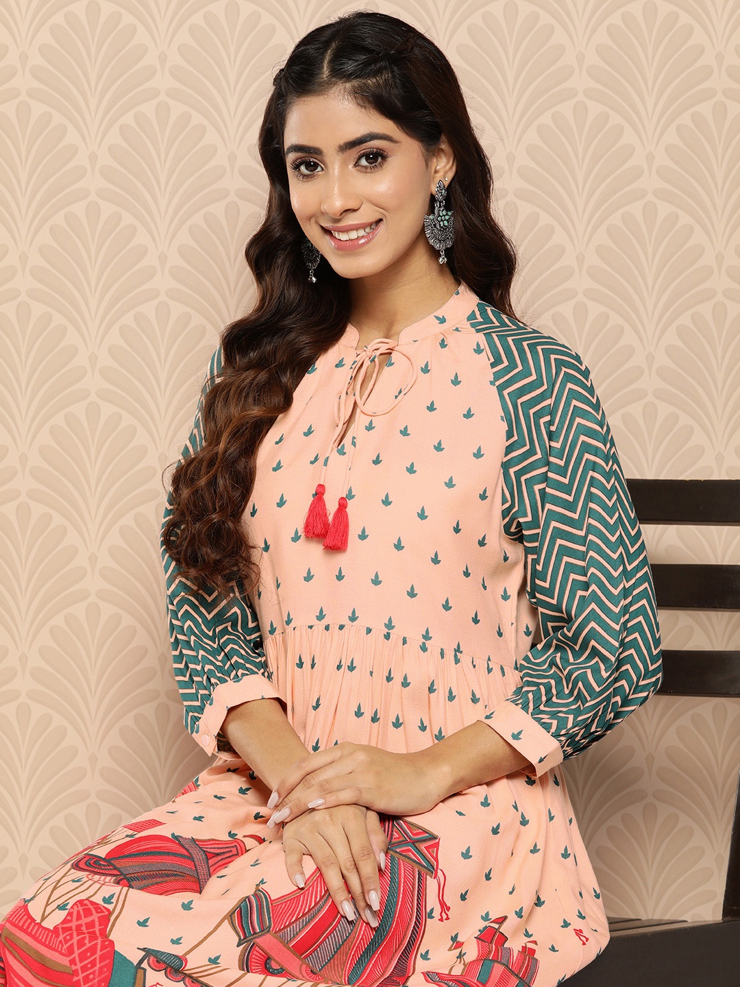 

Sangria Peach Printed Pleated Sleeve Saga Dress