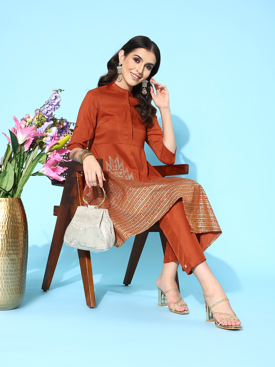 

Sangria Ethnic Motifs Foil Printed Empire Kurta with Trousers, Rust