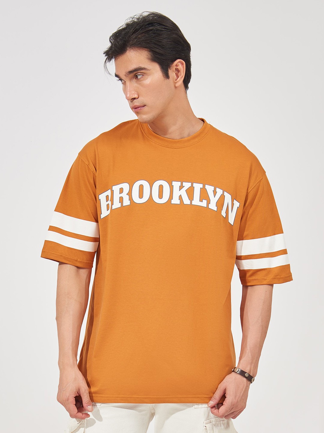 

Maniac Mustard Yellow Drop-Shoulder Sleeves Typography Printed Loose Fit T-shirt