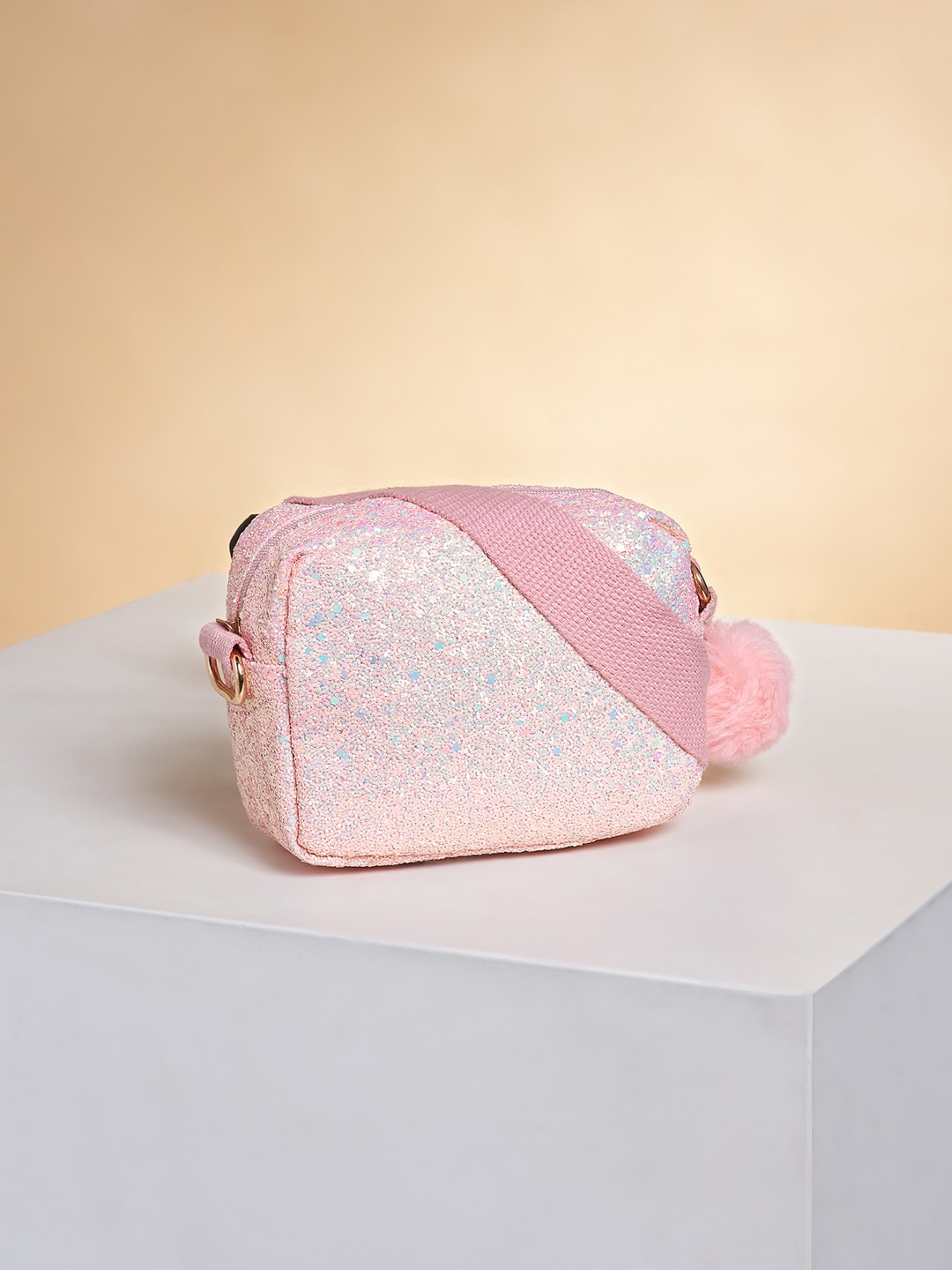 

Pantaloons Junior Girls Embellished Structured Shimmer Sling Bag With Tasselled Detail, Peach