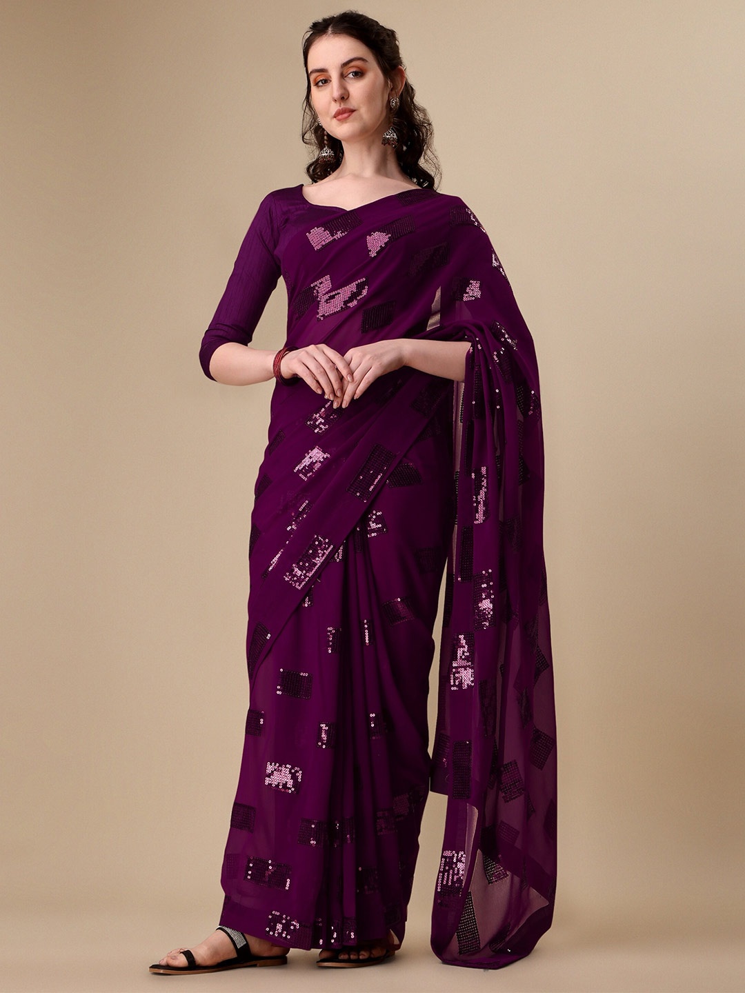 

Vaidehi Fashion Purple Embellished Sequinned Pure Georgette Saree