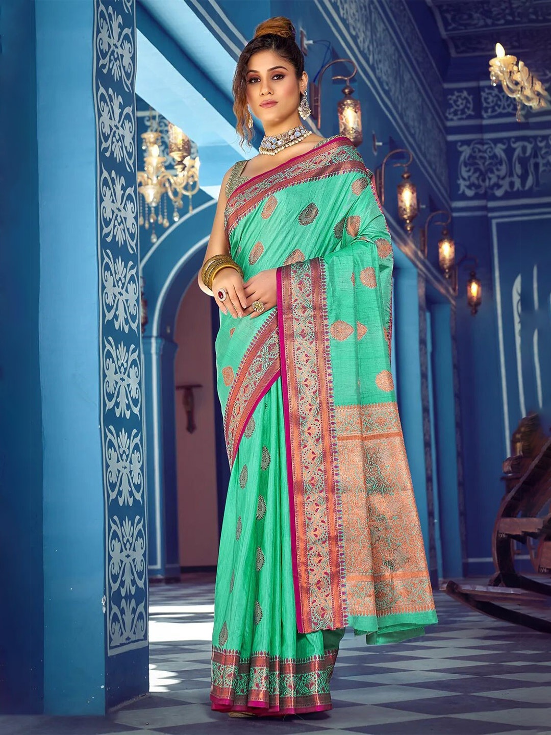 

Mitera Sea Green & Magenta Colour Ethnic Motifs Printed Woven Design Zari Banarasi Saree