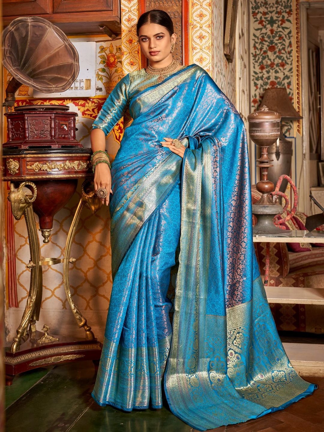 

Mitera Turquoise Blue & Gold-Toned Floral Woven Design Zari Banarasi Saree