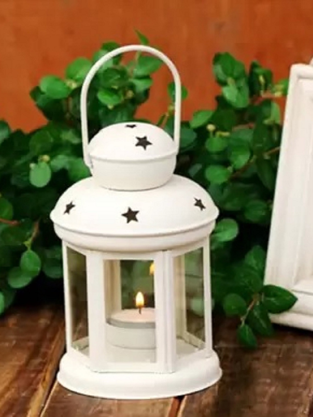 

Fashion Bizz 4-Pcs White Lantern Shaped Metal Tea Light Candle Holders