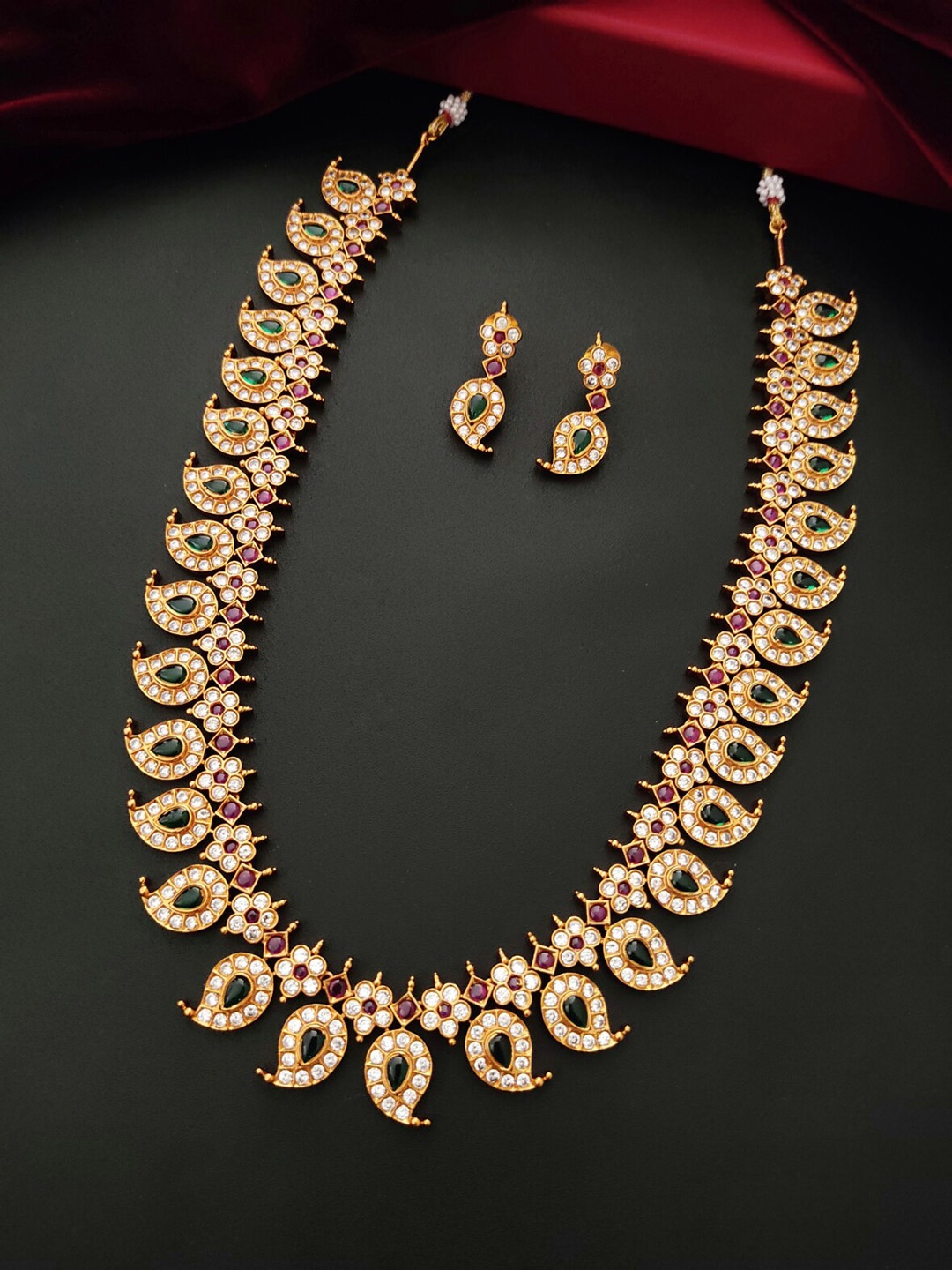 

Pihtara Jewels Gold Plated & Stone Studded Necklace & Earrings