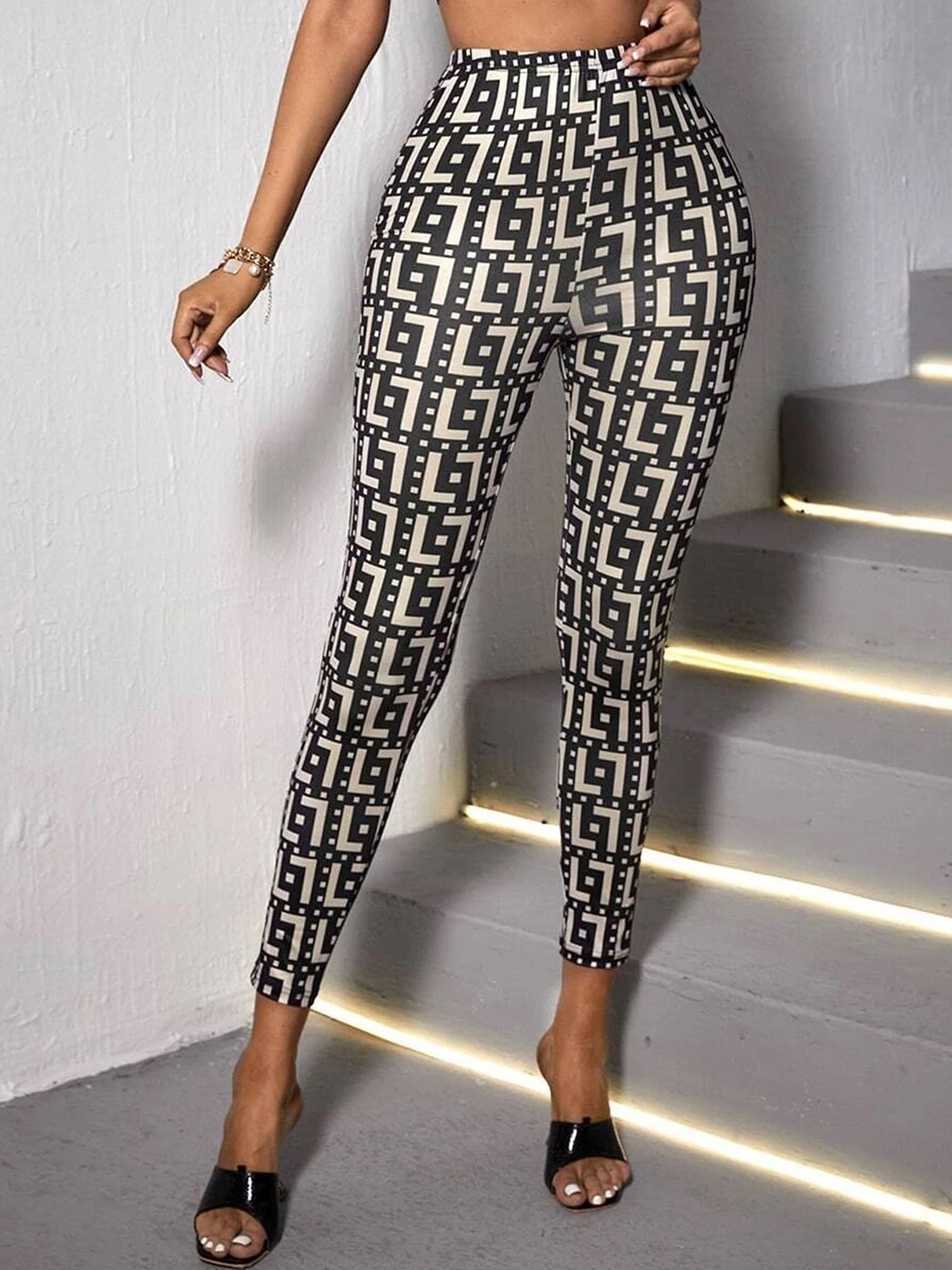 

Sugathari Women Printed Slim Fit Wrinkle Free Trousers, Black