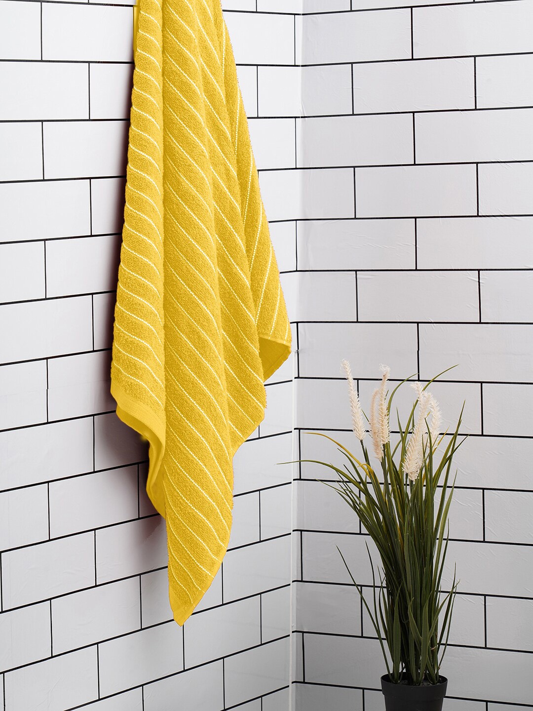 

Welspun Yellow Striped 250 GSM Pure Cotton Bath Towel