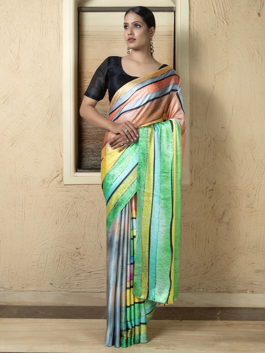 

Anouk Green & Yellow Striped Satin Saree