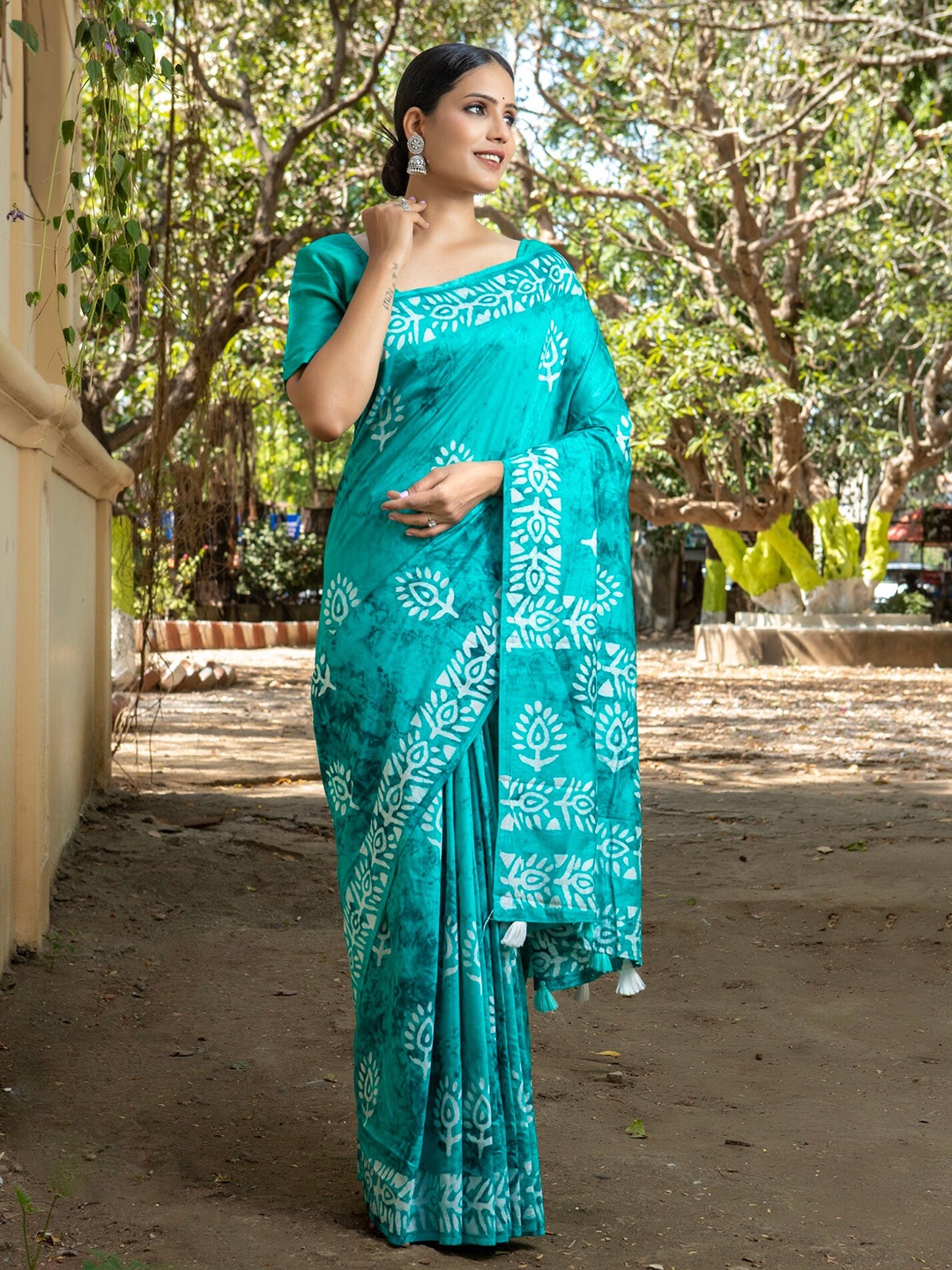 

Anouk Turquoise Blue & White Batik Saree