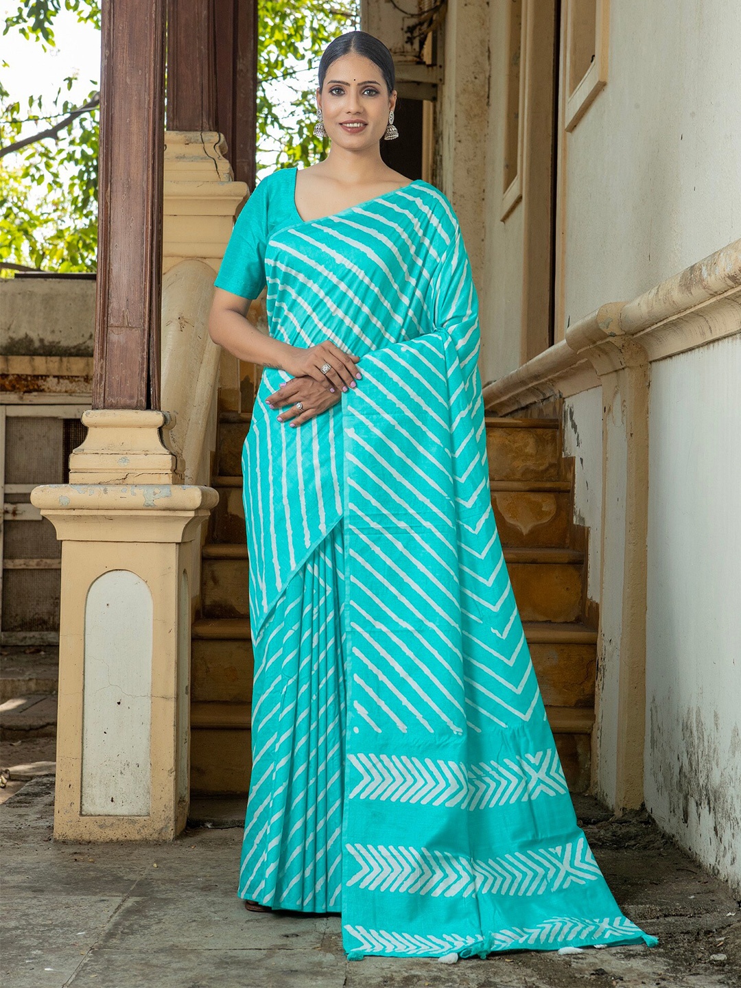 

Anouk Turquoise Blue & White Striped Saree