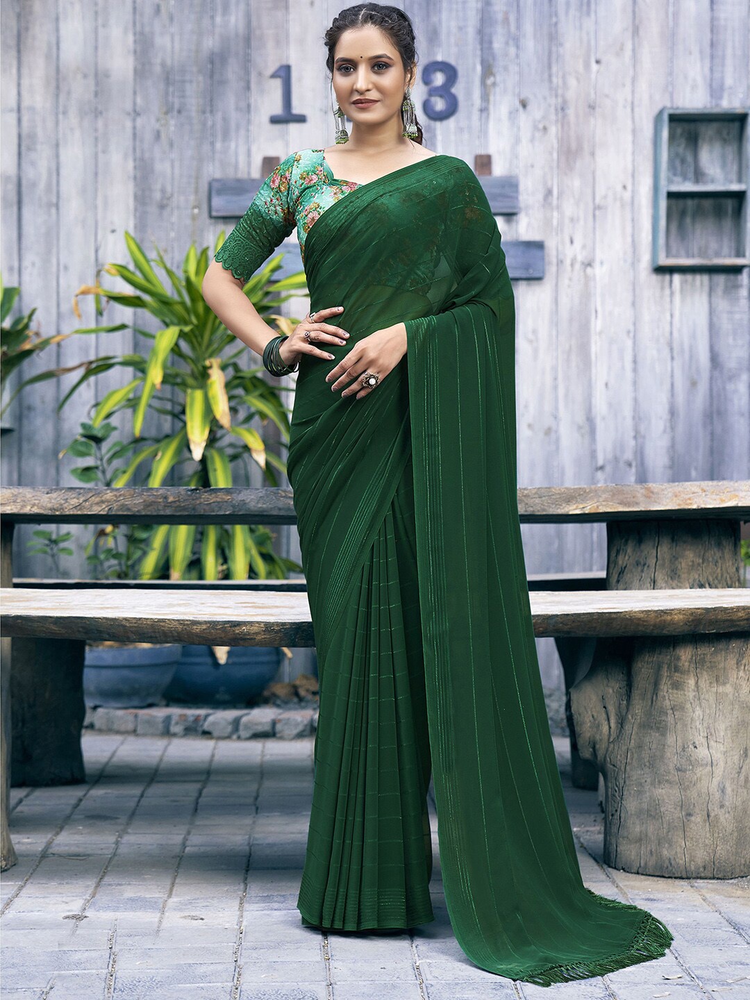 

Mitera Green Striped Poly Georgette Saree