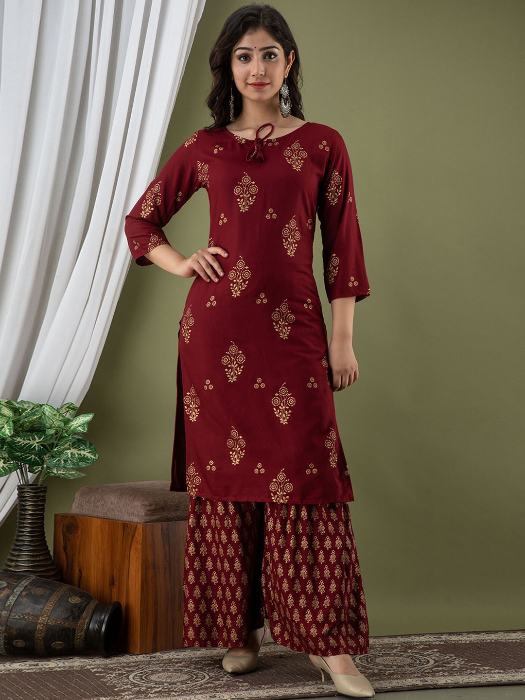 

Mialo fashion Ethnic Motifs Printed Tie-Up Neck Kurta With Sharara, Maroon
