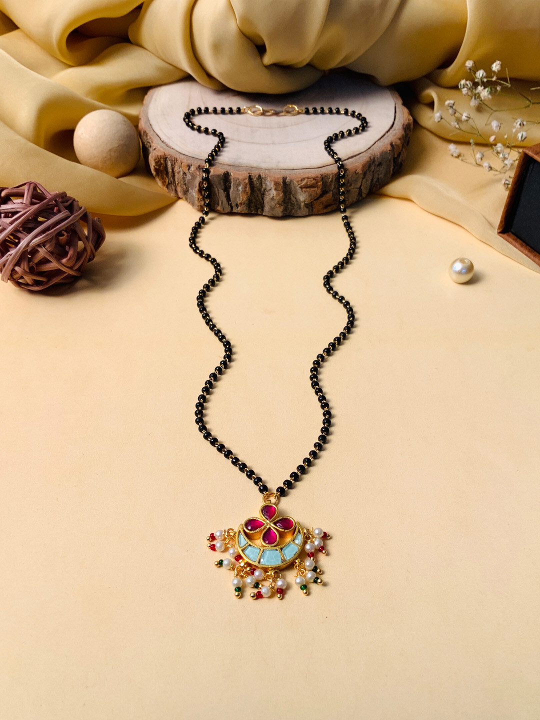 

ABDESIGNS Gold-Plated Kundan Studded & Black Beaded Mangalsutra