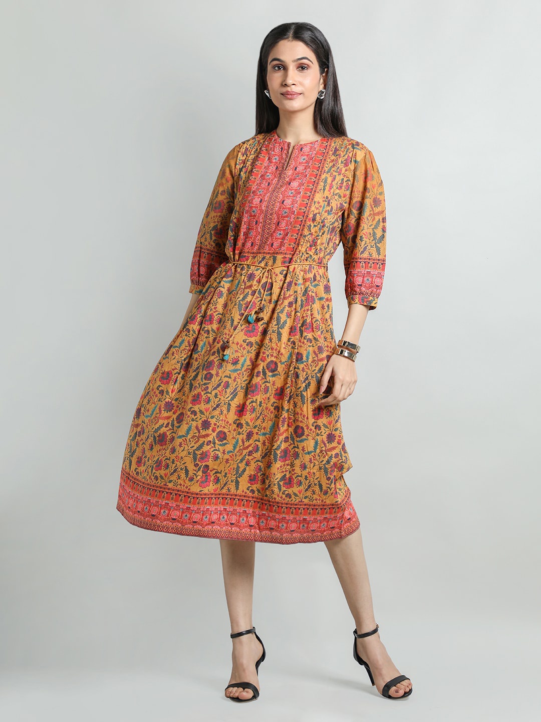 

Dlanxa Ethnic Motifs Printed A-Line Midi Dress, Mustard