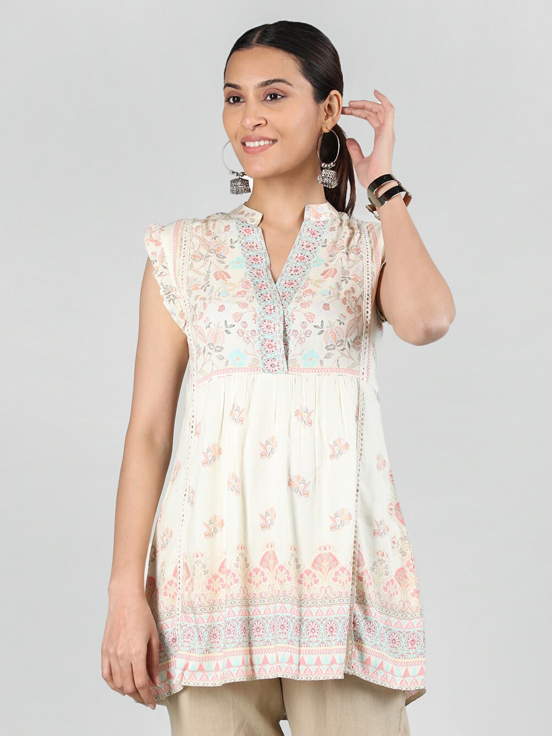

Dlanxa Floral Printed Flutter Sleeves Tunic, Off white