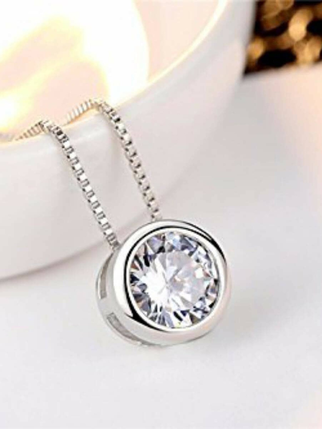 

MYKI Silver-Plated Cubic Zirconia Pendant With Earrings