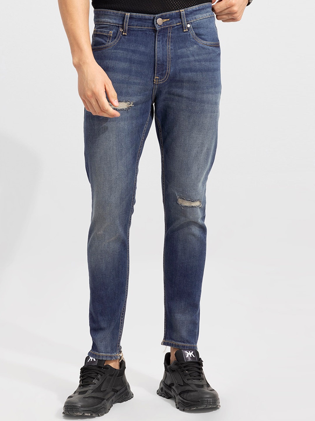 

Snitch Men Blue Slash Knee Heavy Fade Whiskers & Chevrons Skinny Fit Jeans