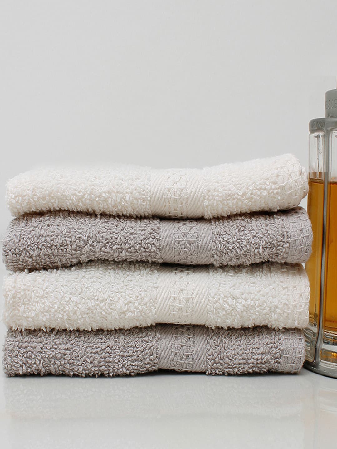 

AVI Living 4-Pcs Grey & White Self-Design 450 GSM Pure Cotton Hand Towels