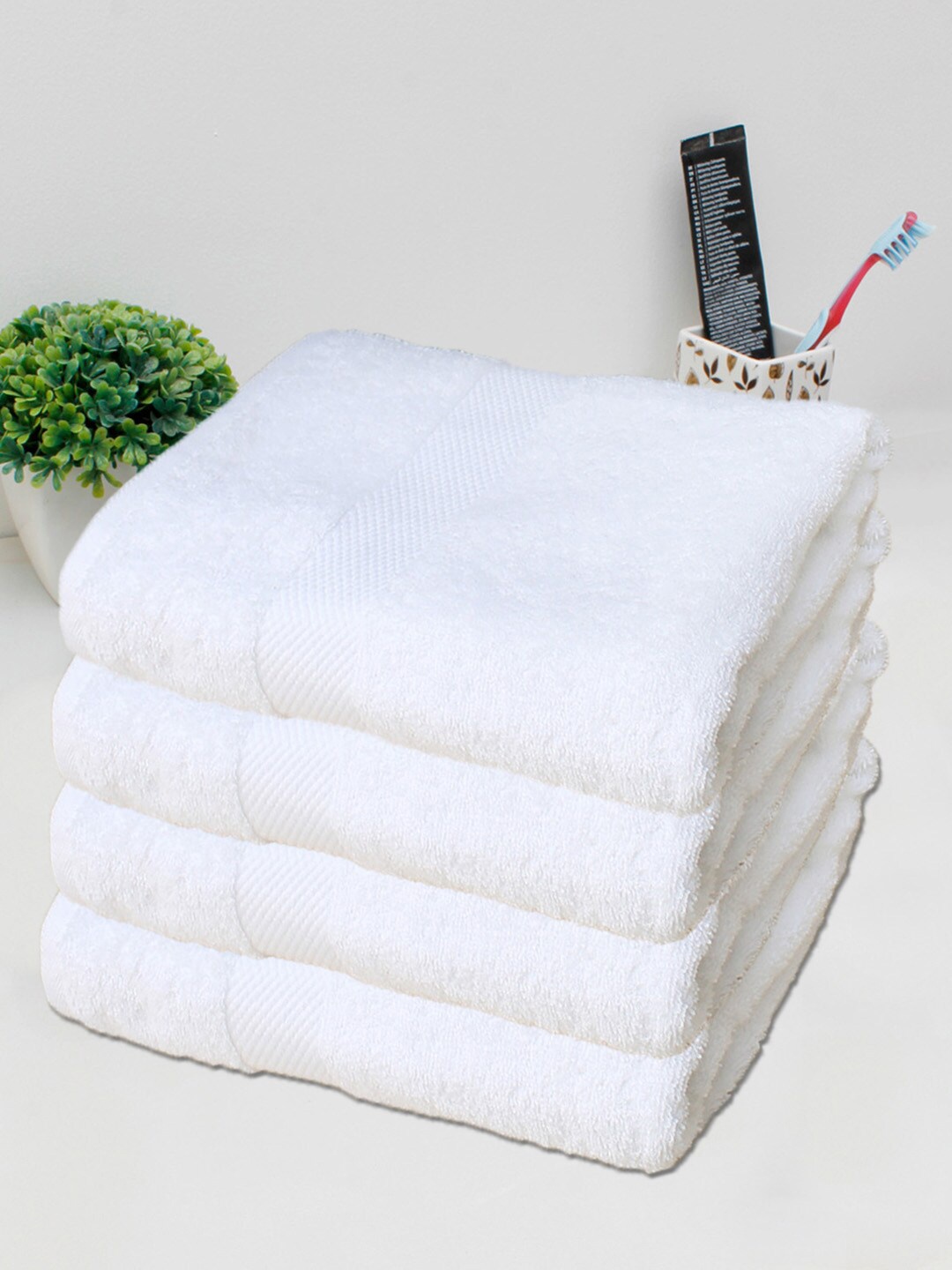 

AVI Living White 4 Pieces Self-Designed 550 GSM Pure Cotton Bath Towels
