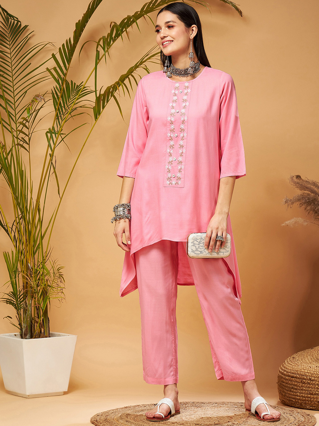 

Shae by SASSAFRAS Pink Thread Work High Low Kurta With Trousers