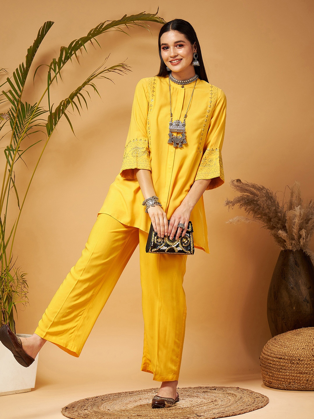 

Shae by SASSAFRAS Yellow Floral Embroidered Regular Kurti With Palazzos