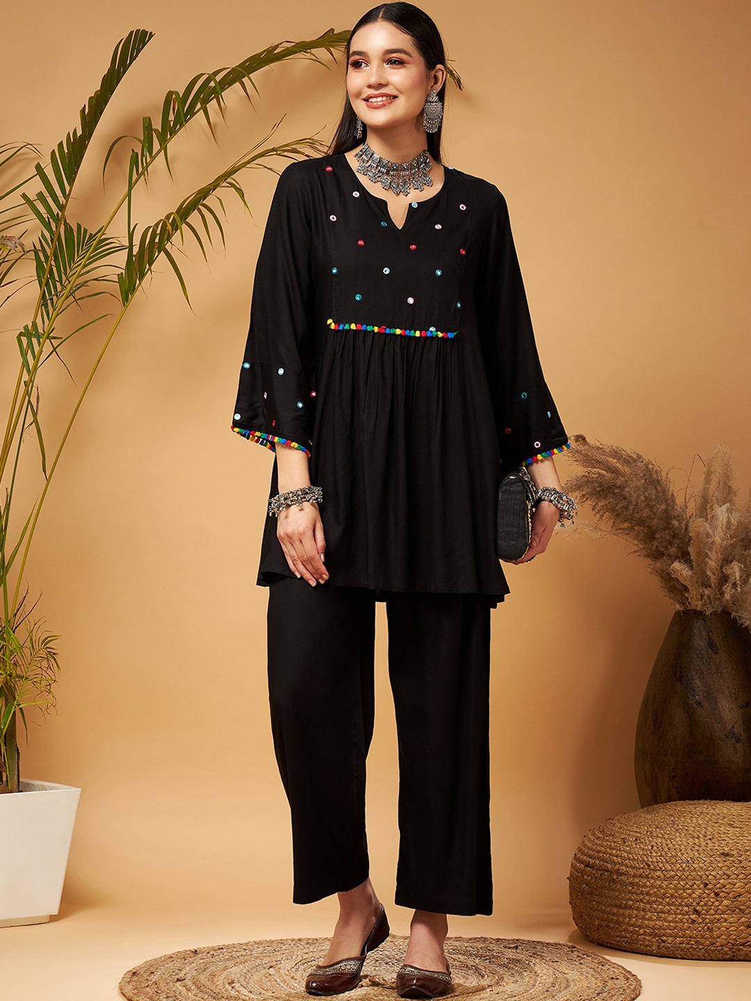 

Shae by SASSAFRAS Black Geometric Embroidered Mirror Work Kurti With Palazzos