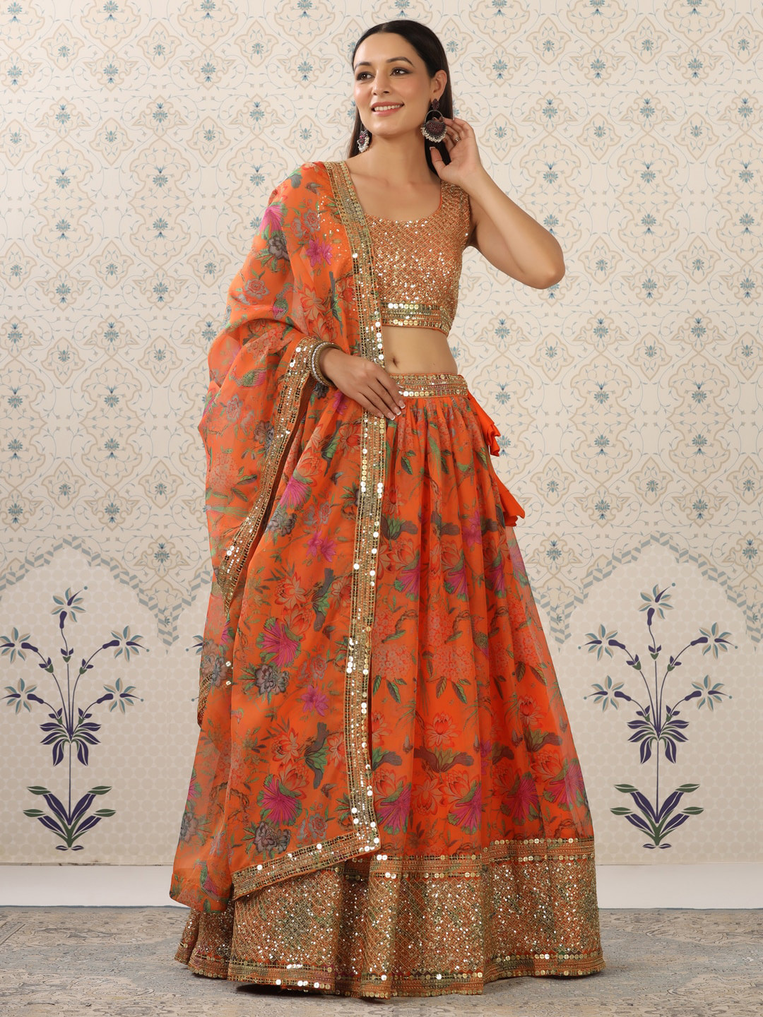

Ode by House of Pataudi Orange & Gold-Toned Semi-Stitched Lehenga & Unstitched Blouse