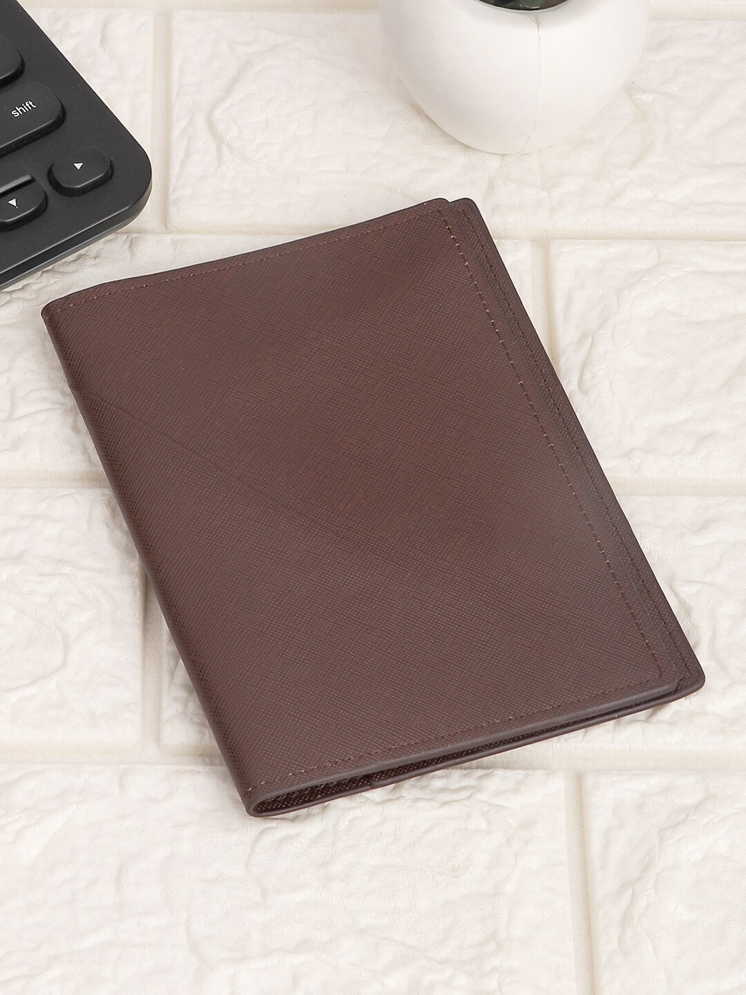 

Roadster Brown Textured Passport Holder